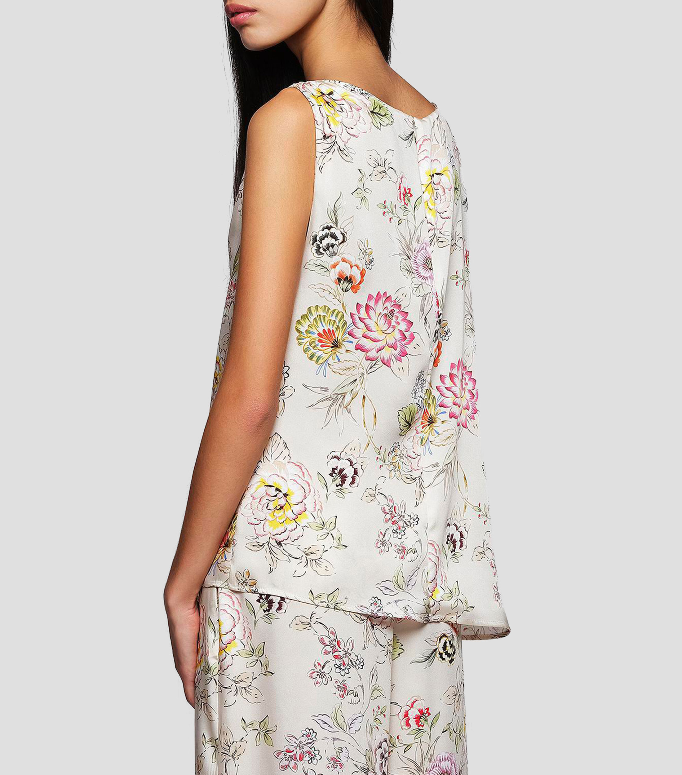 Blusa estampada sin mangas Mujer